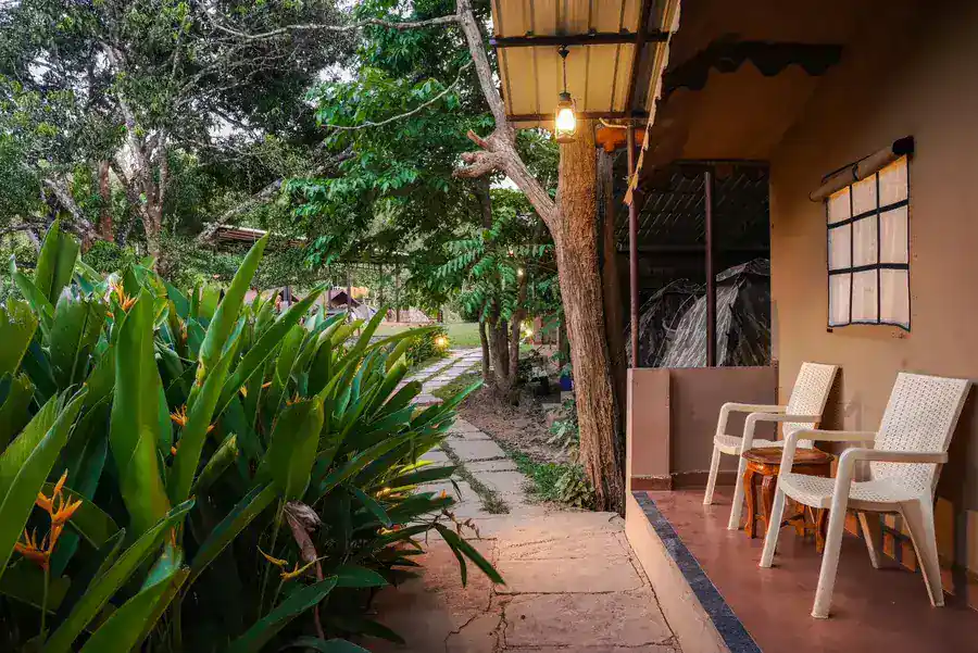 Private veranda of Maharaja cottage for relaxation at Tusker Trails