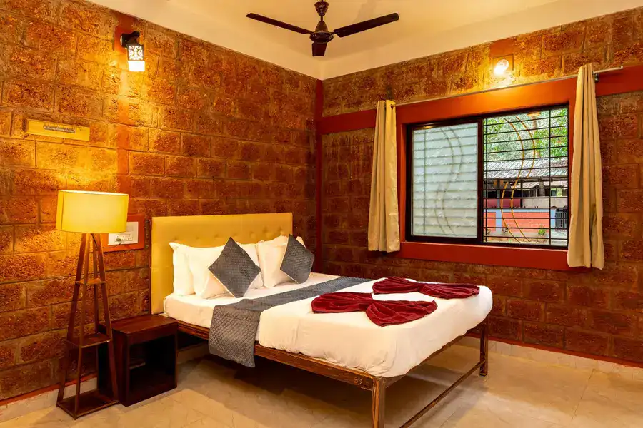 Non-AC 2-sharing room for couples at Tusker Trails